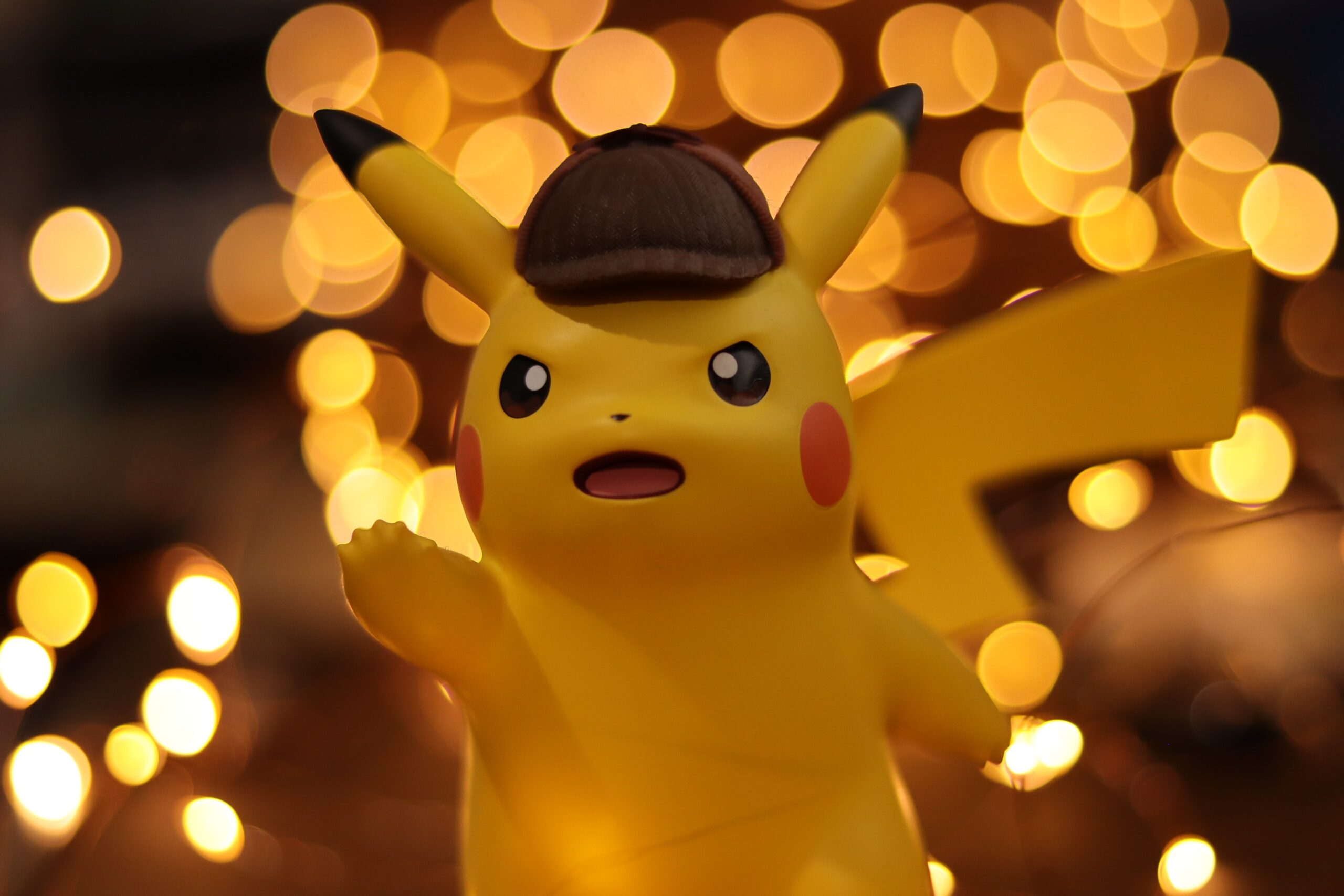 An image of a pickachu with a hat.