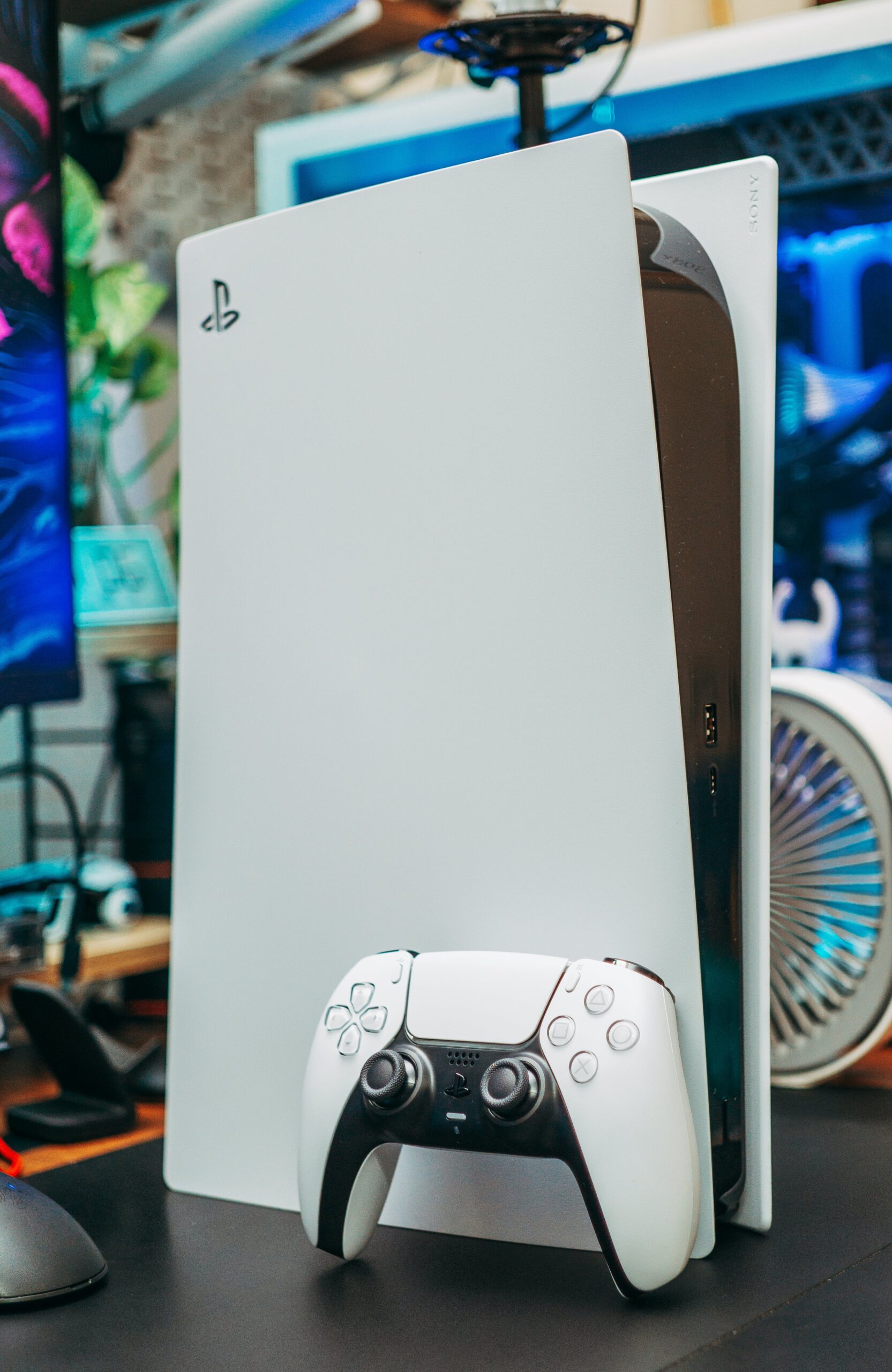 An image of a PS5 in a gaming room.